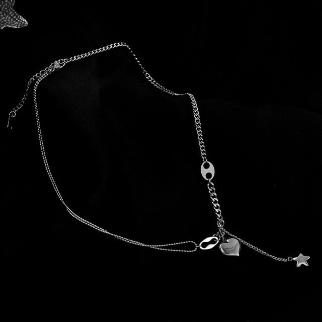 Collar asimétrico con corazón y estrella